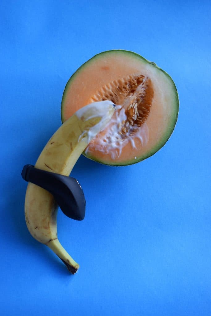 banana sideways on melon with penis ring